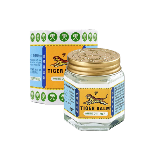 Tiger Balm white ointment jar with gold lid on a white background