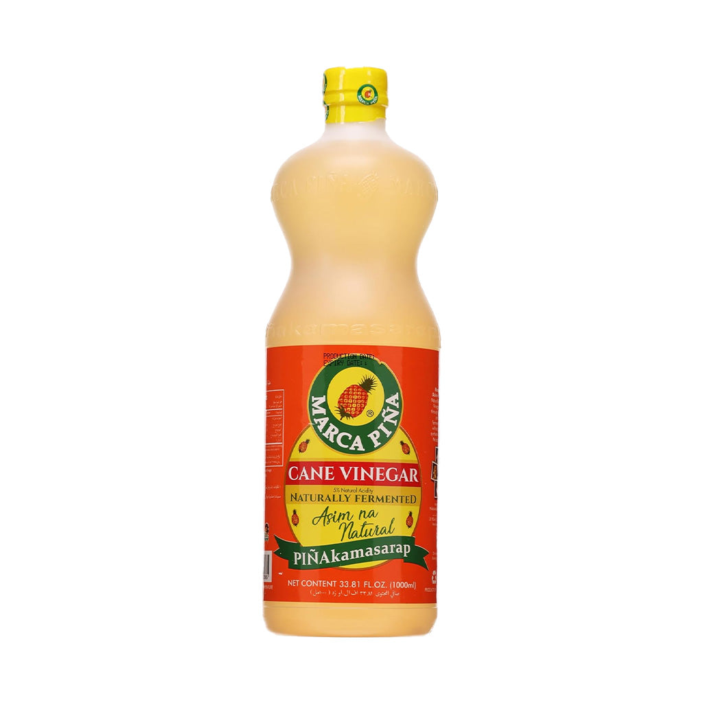 Bottle of Marca Pinakamahusay Cane Vinegar on a white background