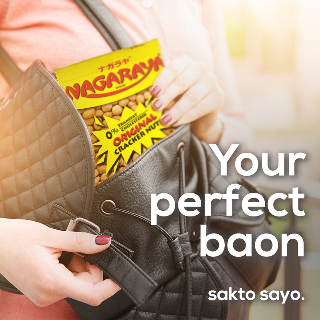 Person holding a bag with Nagaraya Original Cracker Nuts 160g packaging, text 'Your perfect baon' and 'sakto sayo.'