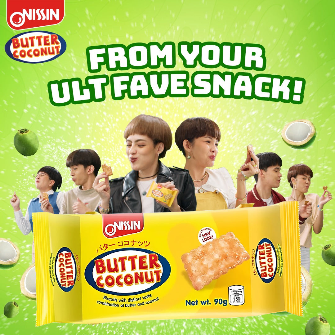 Nissin Butter Coconut snack package with people holding it against a green background