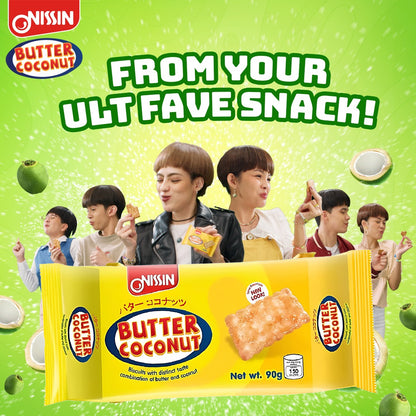 Nissin Butter Coconut snack package with people holding it against a green background
